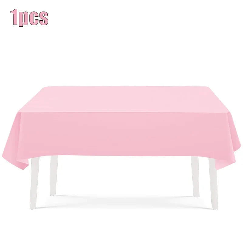 Light pink disposable tableware set with paper plates and cups for kids' parties, baby showers, and celebrations.