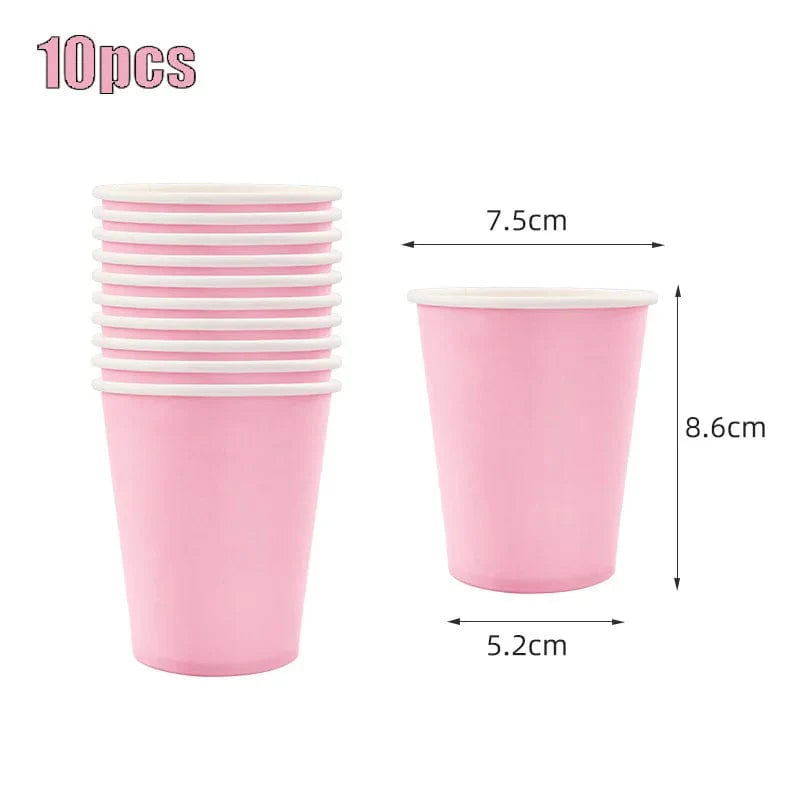 Light pink disposable tableware set with paper plates, cups, and tablecloth for kids' parties and baby showers.