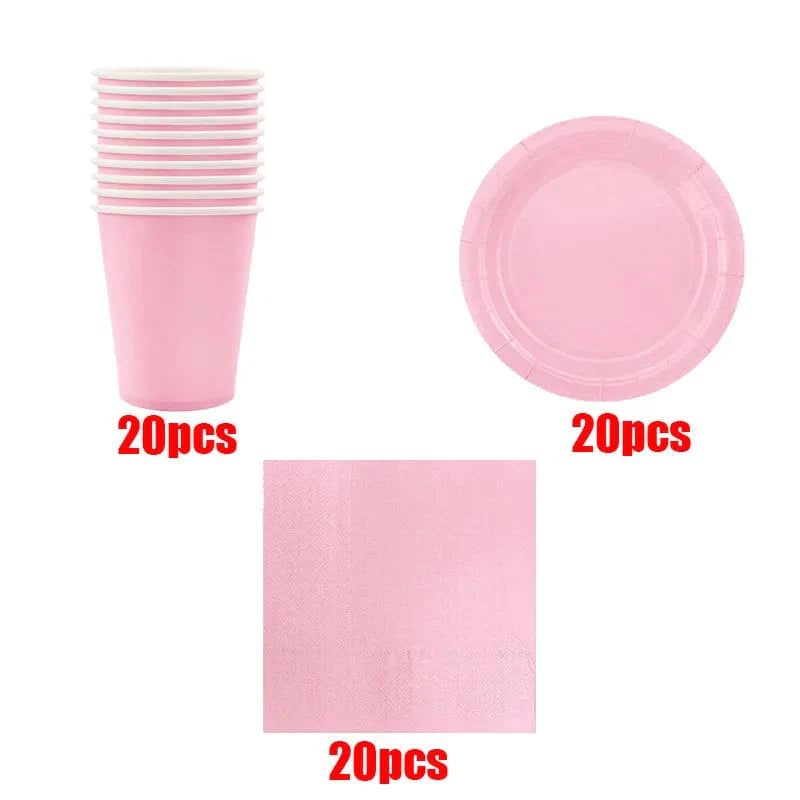 Light pink disposable tableware set including paper plates and cups for kids' parties, baby showers, and celebrations.