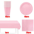 Light pink disposable tableware set with paper plates and cups, ideal for kids' parties and baby showers.