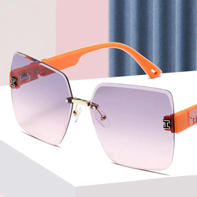 Showlu Women's Rimless Square Sunglasses with UV400 protection and big frame, stylish eyewear for round face fashion.