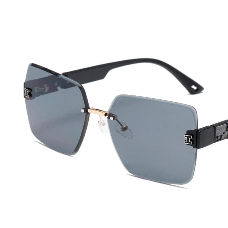 Showlu Women's Rimless Square Sunglasses with big frame, UV400 protection, stylish cut-edge design, perfect for round face shapes