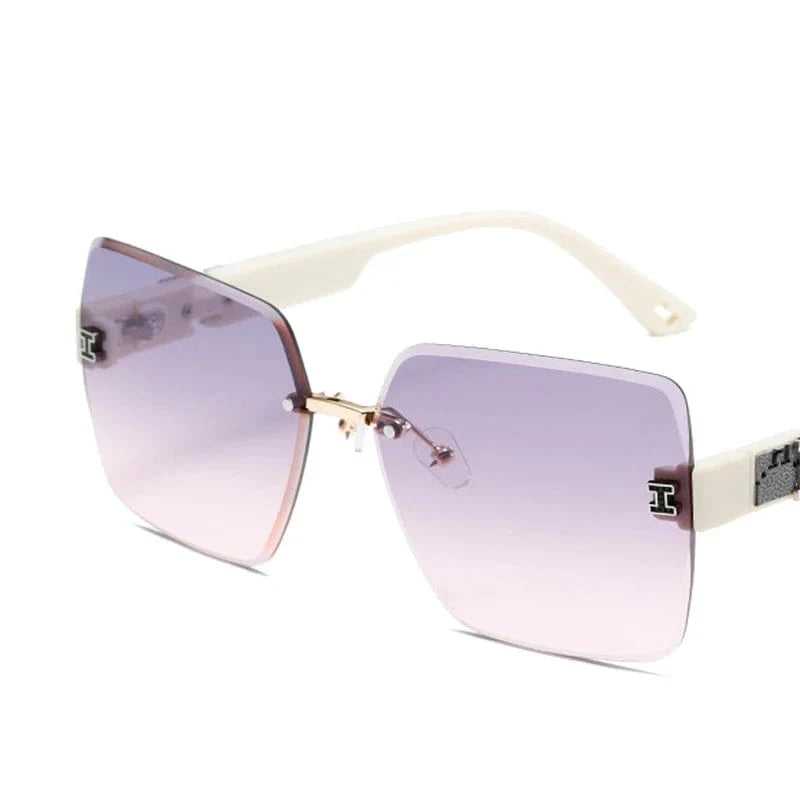 Showlu Women's Rimless Square Sunglasses with big frame, UV400 protection, stylish cut-edge design, suitable for round face.