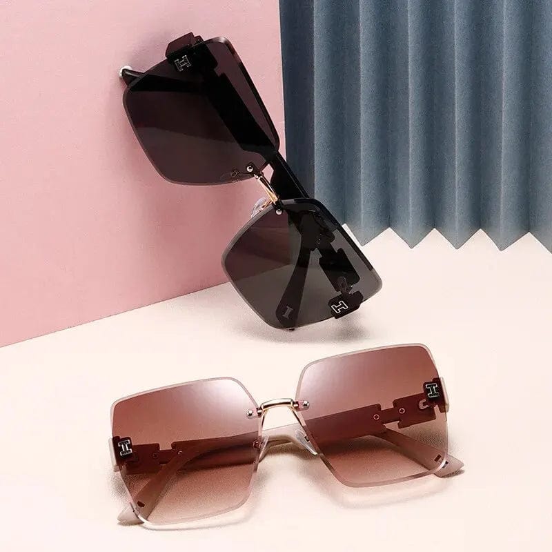 Showlu Women's Rimless Square Sunglasses with big frame, UV400 protection, stylish cut-edge design, suitable for round face shapes.