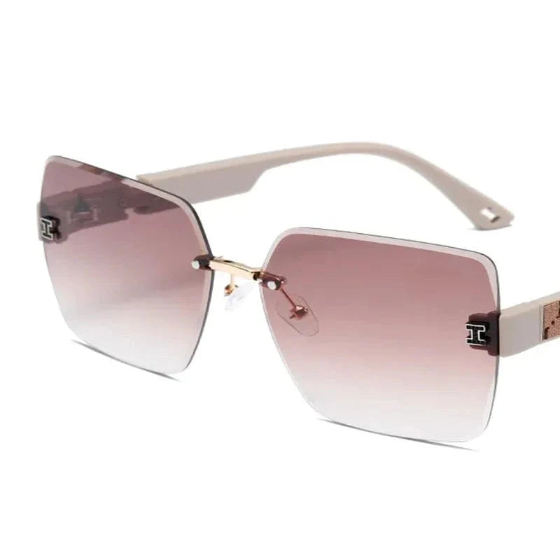 Showlu Women's Rimless Square Sunglasses with big frame, UV400 protection, sleek cut-edge design, stylish eyewear for ladies.