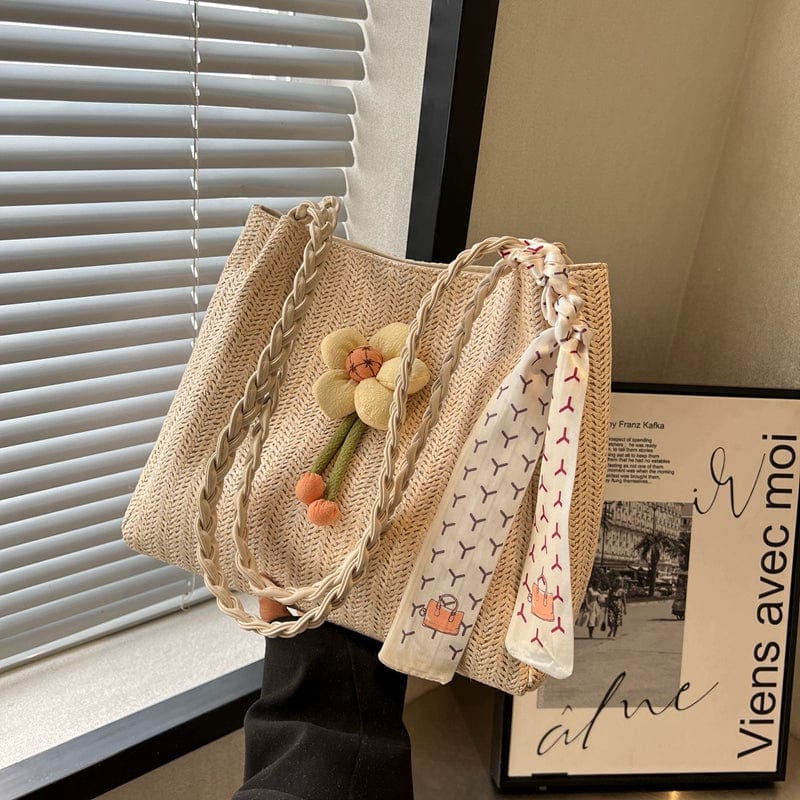 Large capacity Soo Cat woven straw bucket bag with shoulder strap, perfect for summer vacations and casual outings.