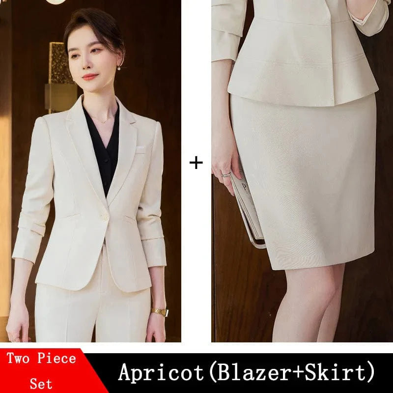 Wine red women's slim fit skirt suit with blazer and coat, professional office attire for women by Showlu Fashion.