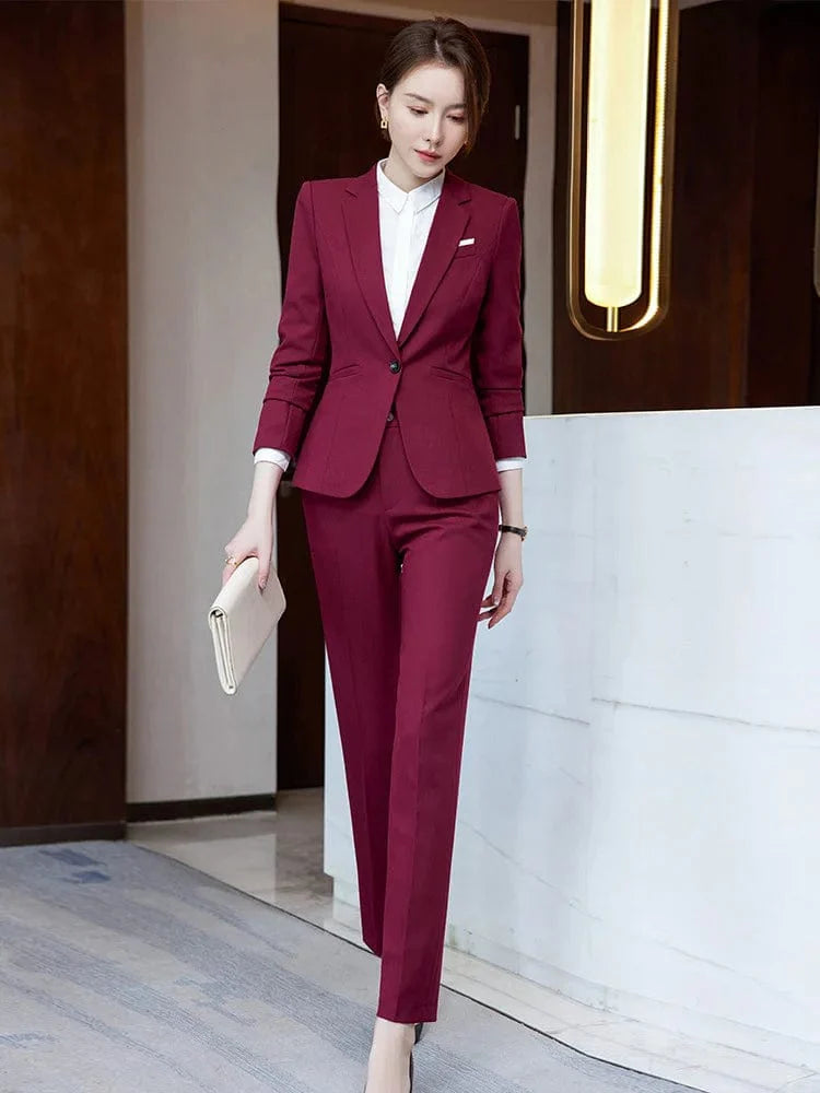 Wine red women's slim fit skirt suit with blazer and coat, professional office attire for women by Showlu Fashion.