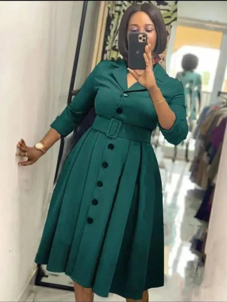 SHOWLU Women's long sleeve A-line midi office dress with waist belt, featuring button-down front and notched lapel for elegant workwear.