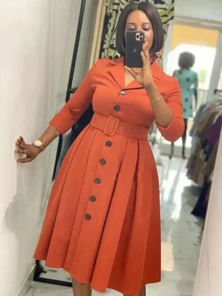 SHOWLU Women's long sleeve A-line midi office dress with waist belt, featuring a button-down notched lapel for elegant workwear