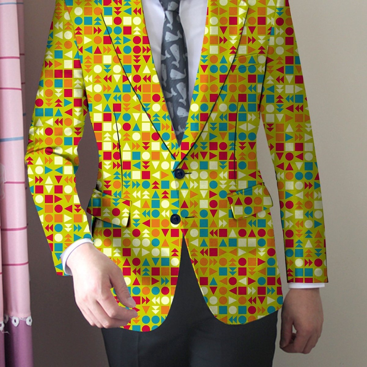 SHOWLU FASHION men's slim fit blazer with vibrant geometric print, featuring buttoned lapels in orange, green, and blue polyester fabric.