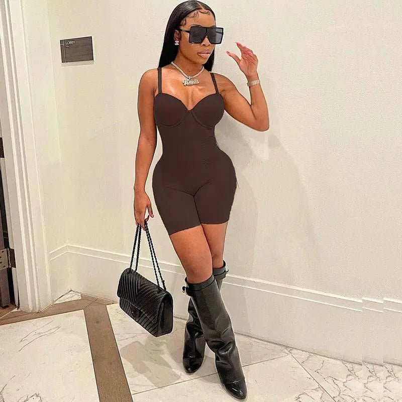 Blue ribbed knitted spandex one-piece bodycon bodysuit for women, shown as a fitted party jumpsuit or clubwear.