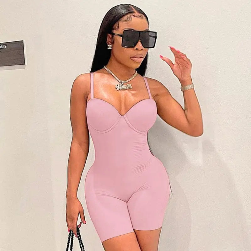 Blue ribbed knitted spandex one-piece bodycon bodysuit for women, stylish party jumpsuit with a fitted silhouette.