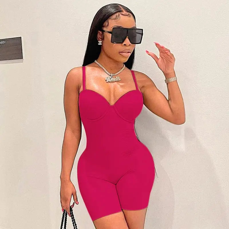 Blue ribbed knitted spandex one-piece bodysuit for women, stylish bodycon party jumpsuit with a fitted silhouette.