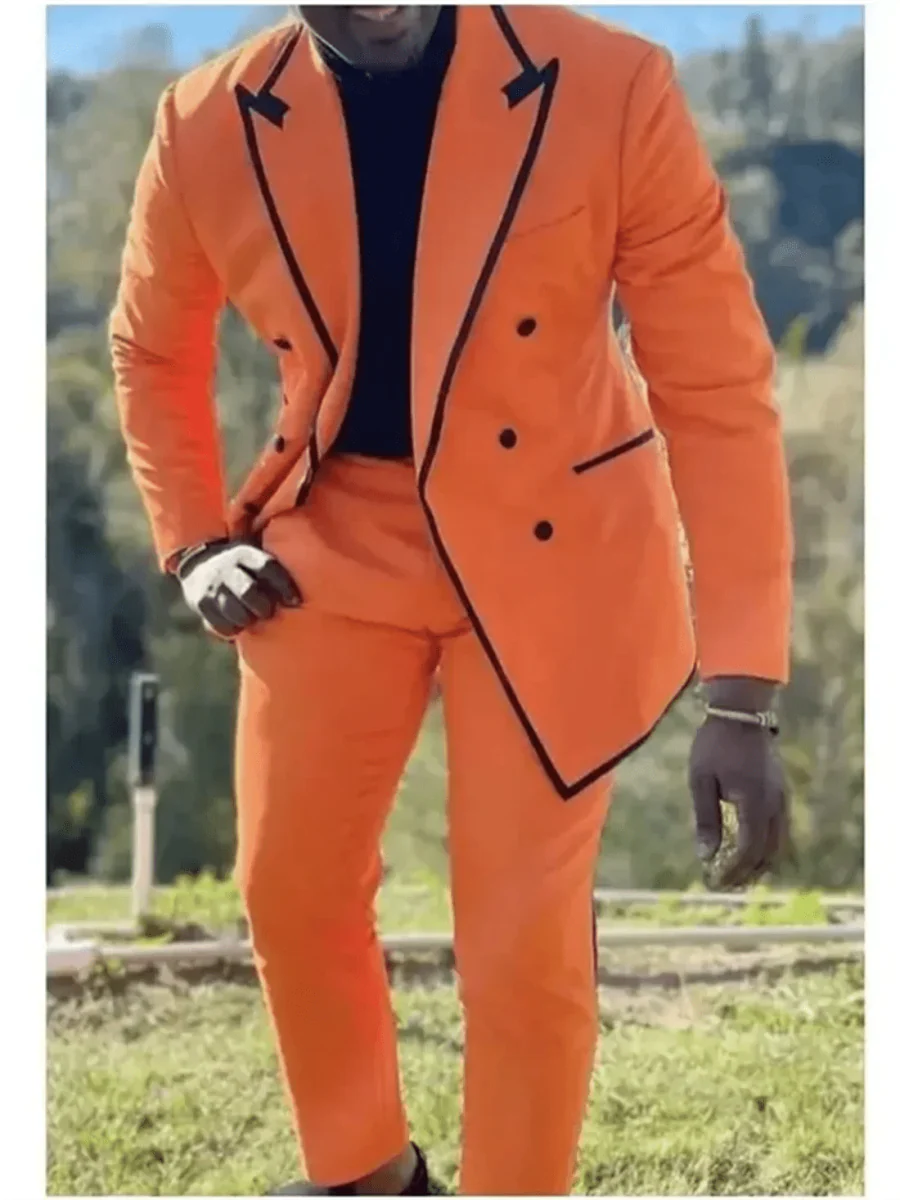 Orange men's 2-piece slim fit wool blend suit with peaked lapel and black trimming, tailored blazer and matching trousers.