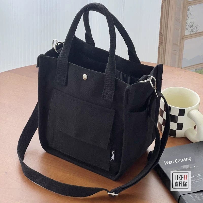 Hefan You multi-pocket canvas tote bag by Showlu Fashion Store, featuring a vertical square crossbody bag with multiple storage compartments.
