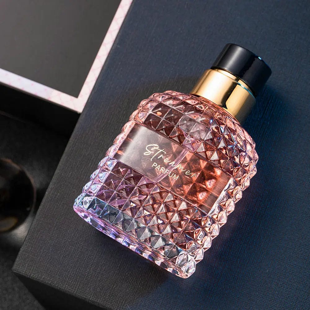 SHOWLU FASHION Floral Scent Eau De Parfum for women, 100ml, long-lasting fragrance with feminine floral aroma in a sleek spray bottle.