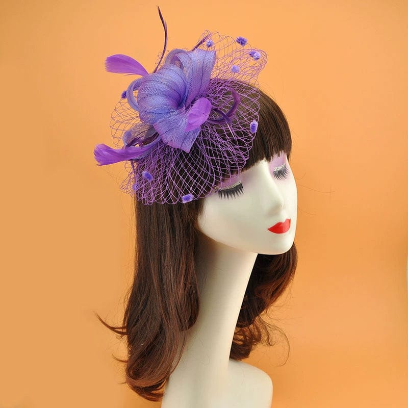 Royal blue vintage feather veil hair clip with mesh flower fascinator and feather accents, perfect for elegant vintage hairstyles.