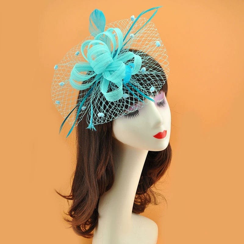 Royal blue vintage feather veil hair clip with mesh flower fascinator and feather details, perfect for elegant occasions.