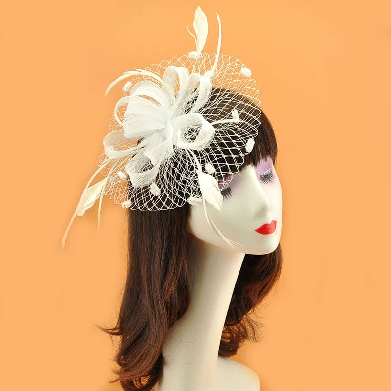 Royal blue feather veil hair clip with vintage mesh flower fascinator, featuring a stylish feather and feathered embellishments.