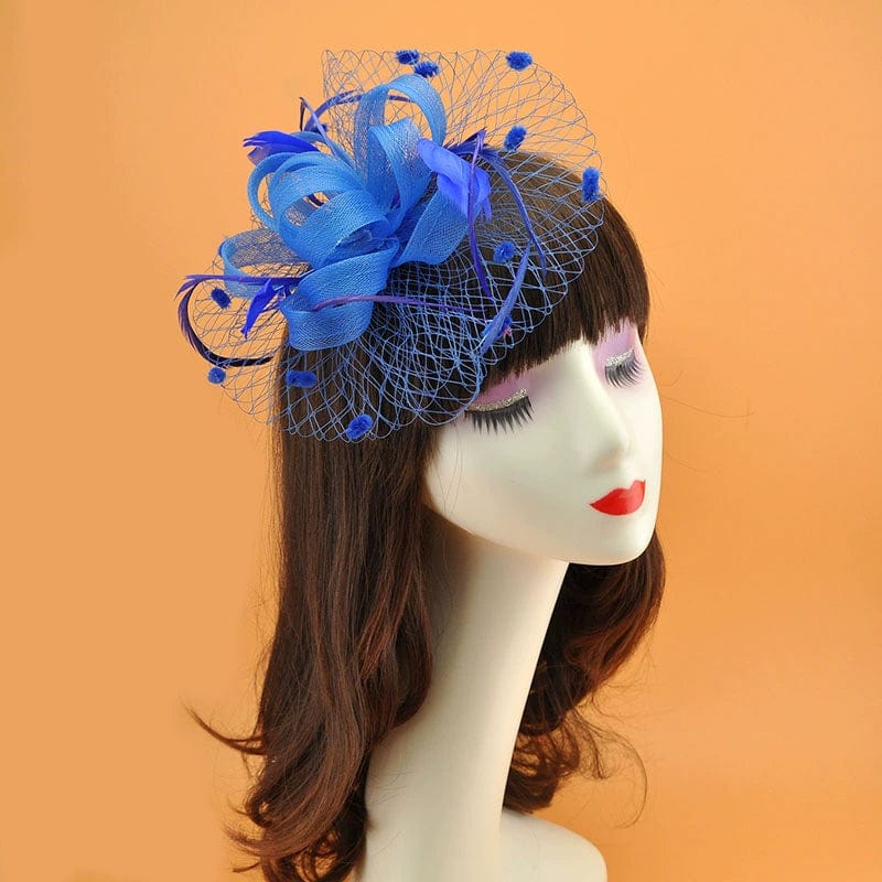 Royal blue vintage feather veil hair clip with mesh flower fascinator, featuring a decorative feather and elegant design.