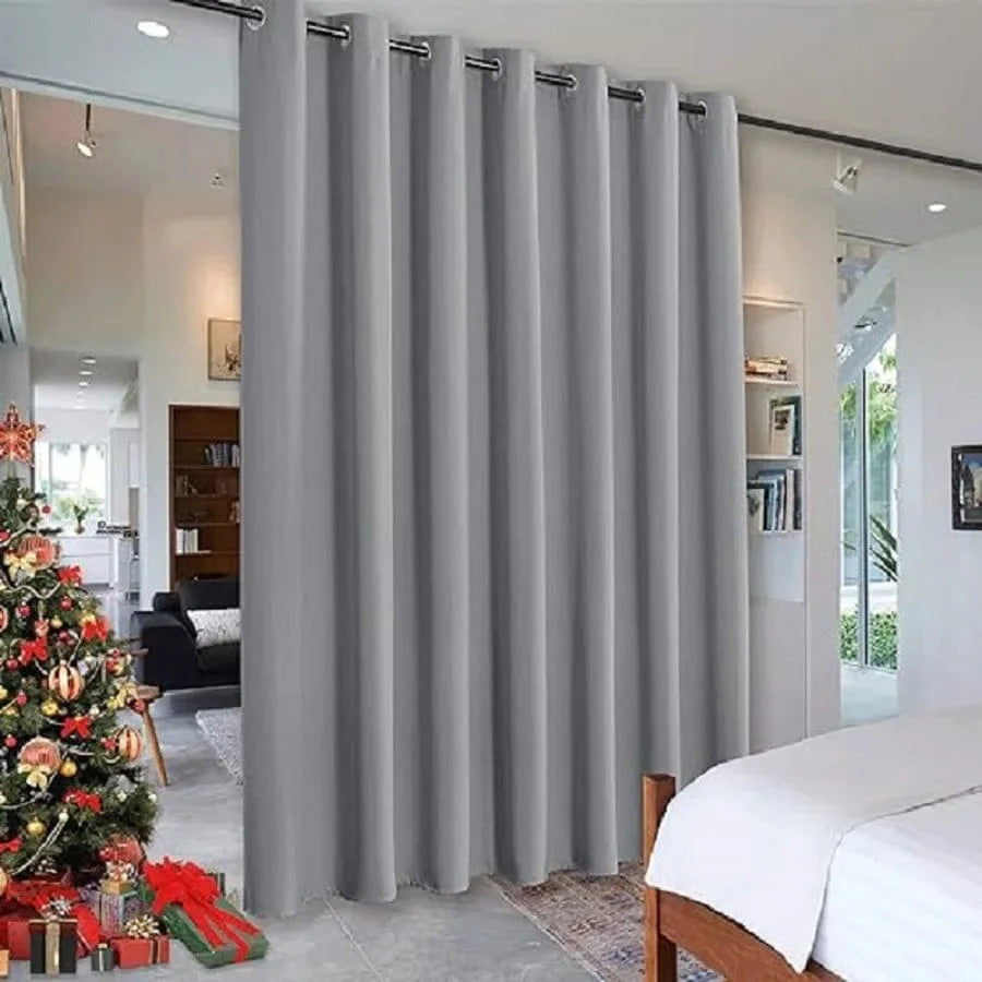 Showlu Fashion black blackout room divider curtain with noise reduction grommet top, ideal for living rooms and privacy.