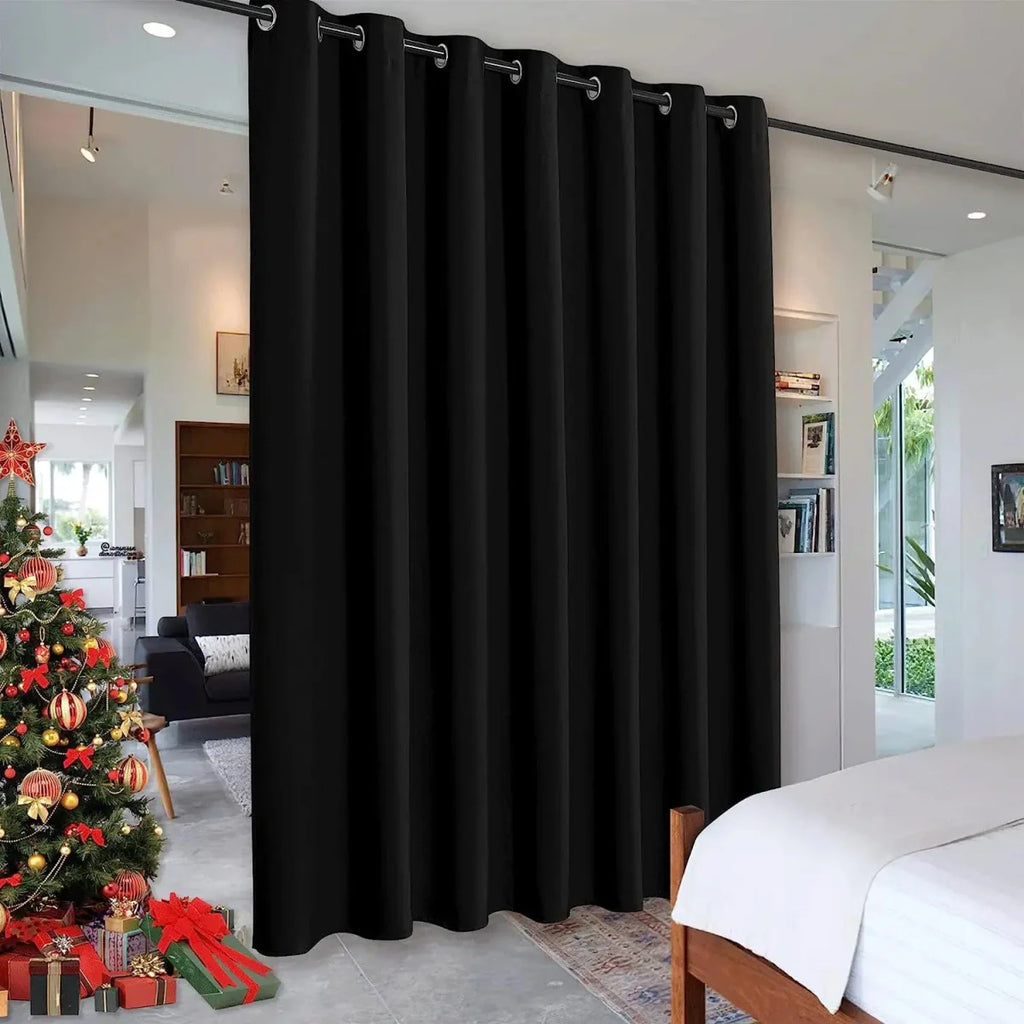 Showlu Fashion blackout room divider curtain with noise-reducing grommet top, black fabric, ideal for living rooms and privacy.