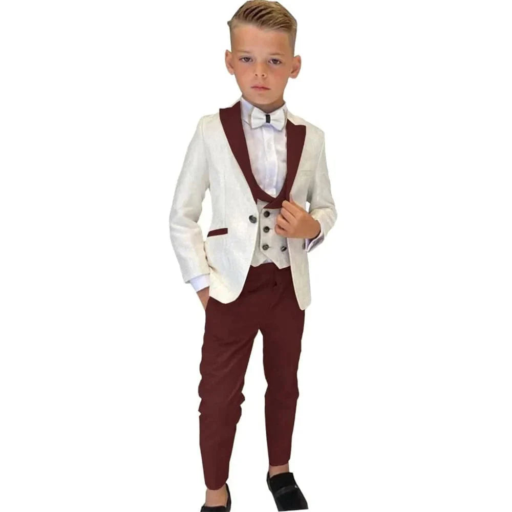 Showlu Boys 3-piece paisley suit featuring a slim fit tuxedo blazer, vest, and pants, perfect for formal events and parties.