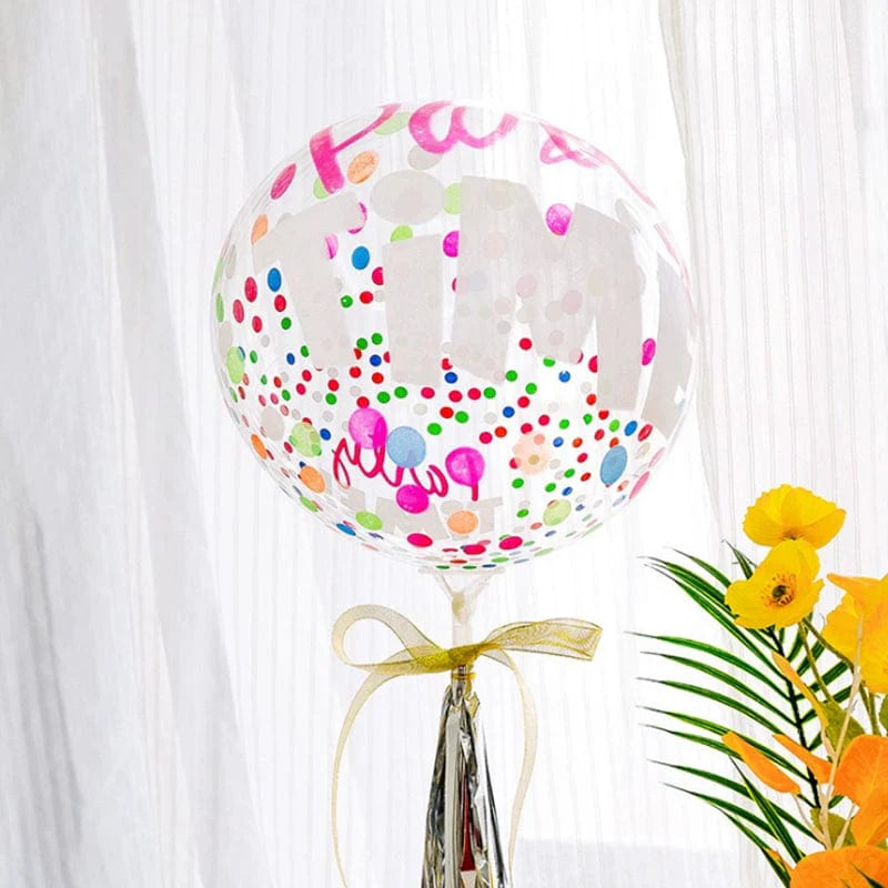 Showlu Fashion Cartoon Birthday Bounce Ball, transparent party balloon with colorful printed cartoon and heart designs for celebrations.