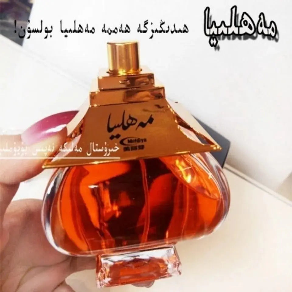 Showlu Fashion Long Lasting Essence Perfume 100ml bottle with a fresh, elegant fragrance and a 15ml travel-sized spritz.