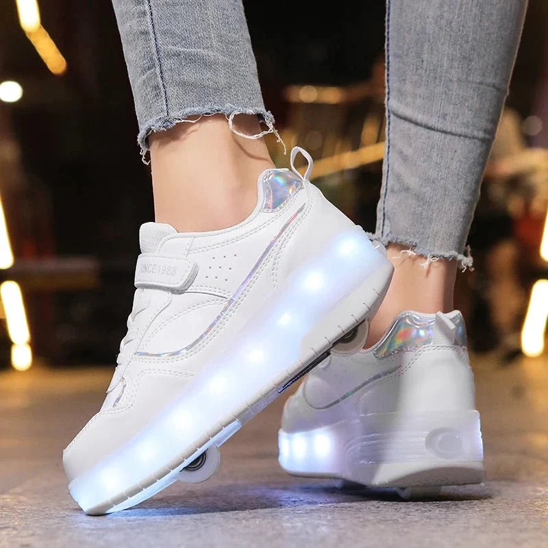 Pink Showlu Fashion Kids LED Light Roller Skate Shoes with wheels, pink PU leather sneakers for boys and girls.
