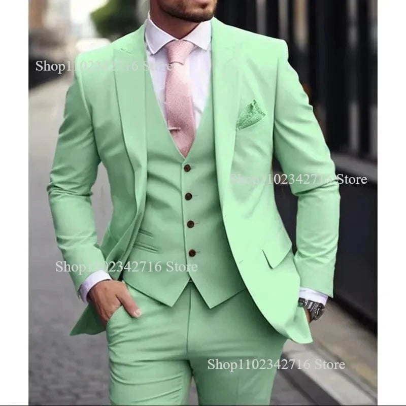 Pink men's slim fit wedding tuxedo with jacket, vest, and pants, perfect for grooms and formal occasions by Showlu Fashion.