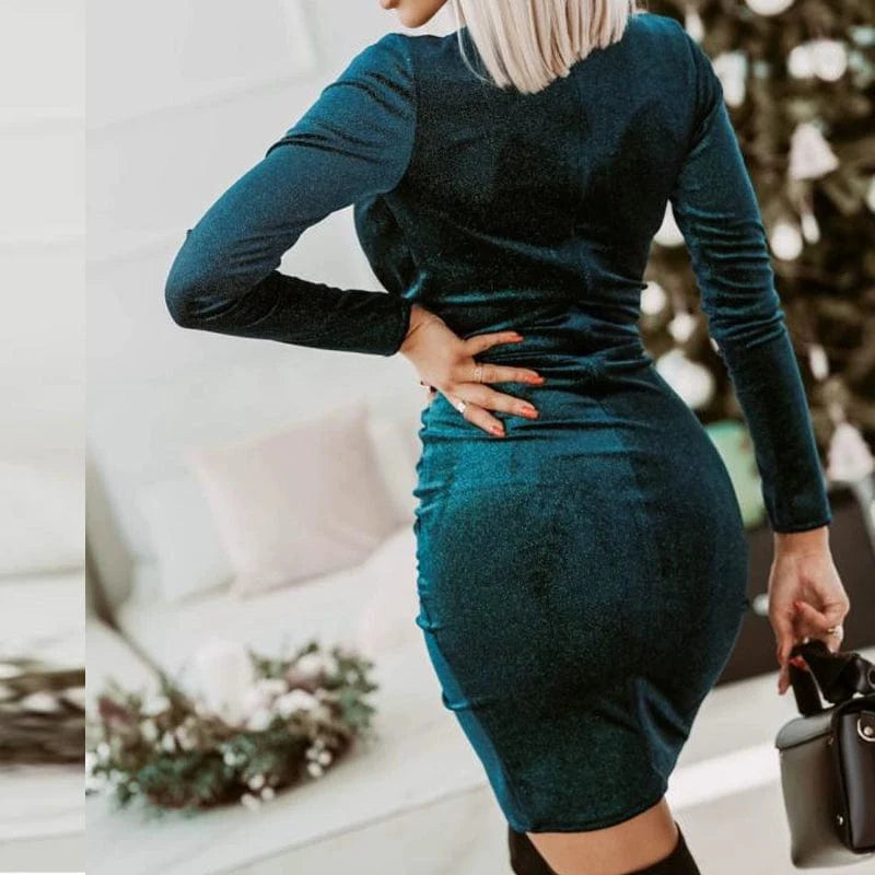 Showlu Fashion women's V-neck pleated pleuche long sleeve mini dress with an irregular hem and elegant design.