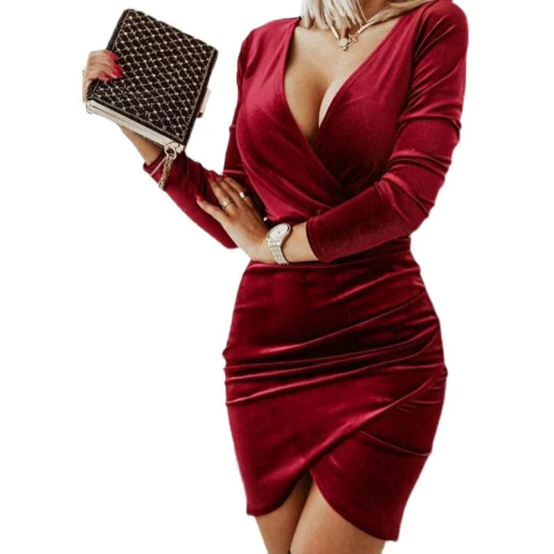 Showlu Fashion women's V-neck pleated pleuche mini dress with long sleeves, featuring an elegant, irregular design.