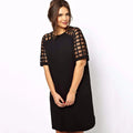 Plus size Showlu mesh panel slimming dress with knee length and belly covering design, perfect for a flattering, comfortable fit.