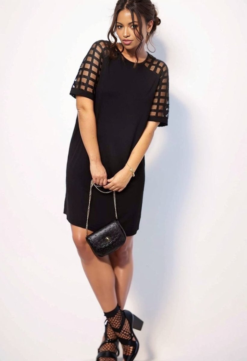 Plus size Showlu mesh panel slimming dress with knee-length design and belly coverage, perfect for a flattering, comfortable fit.