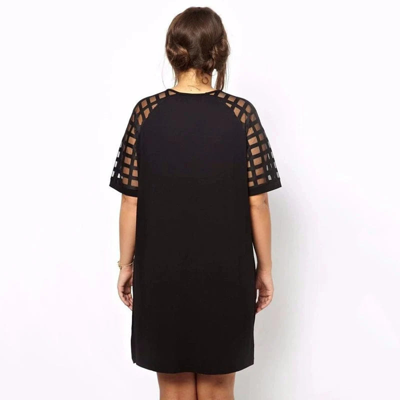Plus size Showlu mesh panel slimming dress with knee-length design and belly coverage, ideal for a flattering, comfortable fit.