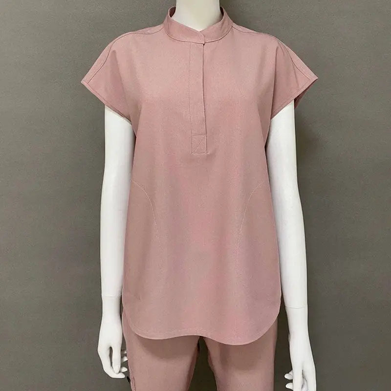 Showlu Medical Scrubs Set with V-neck, short-sleeve nurse uniform top and matching stretch cotton-poly scrub bottoms.