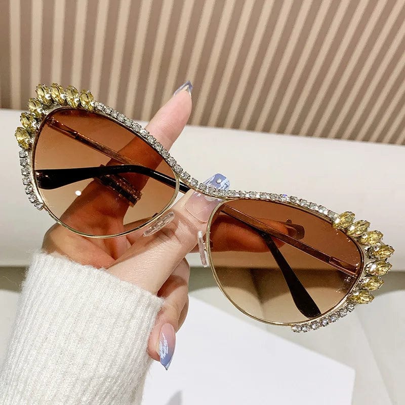 Buyuteen Y2K vintage cat eye sunglasses with pink crystal accents, featuring luxury metal frames and a stylish punk-inspired design.