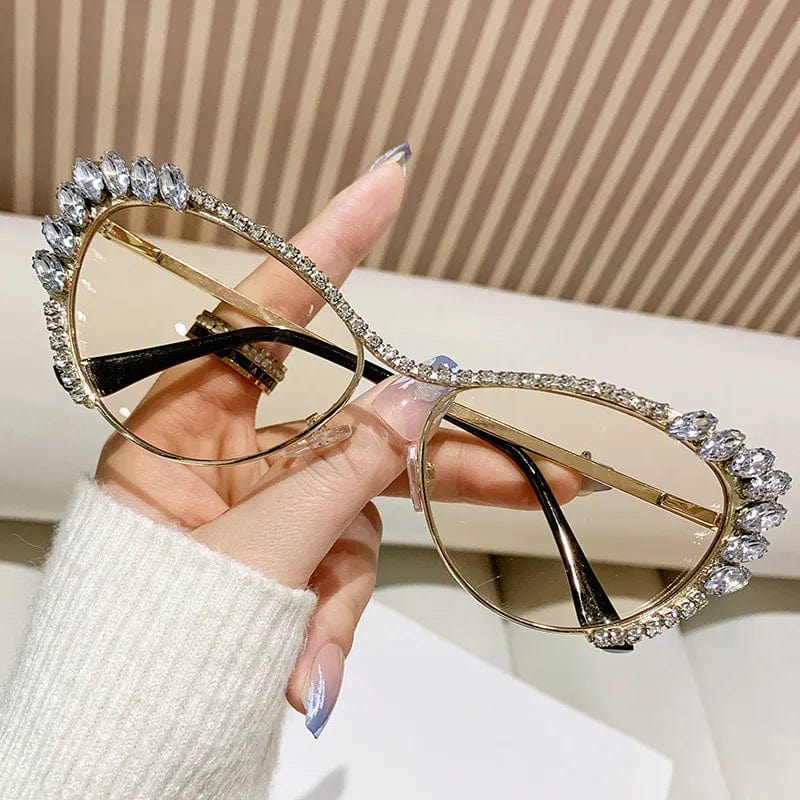 Buyuteen Y2K vintage cat eye sunglasses with pink crystal accents, luxury metal frame, fashionable crystal shades for women.