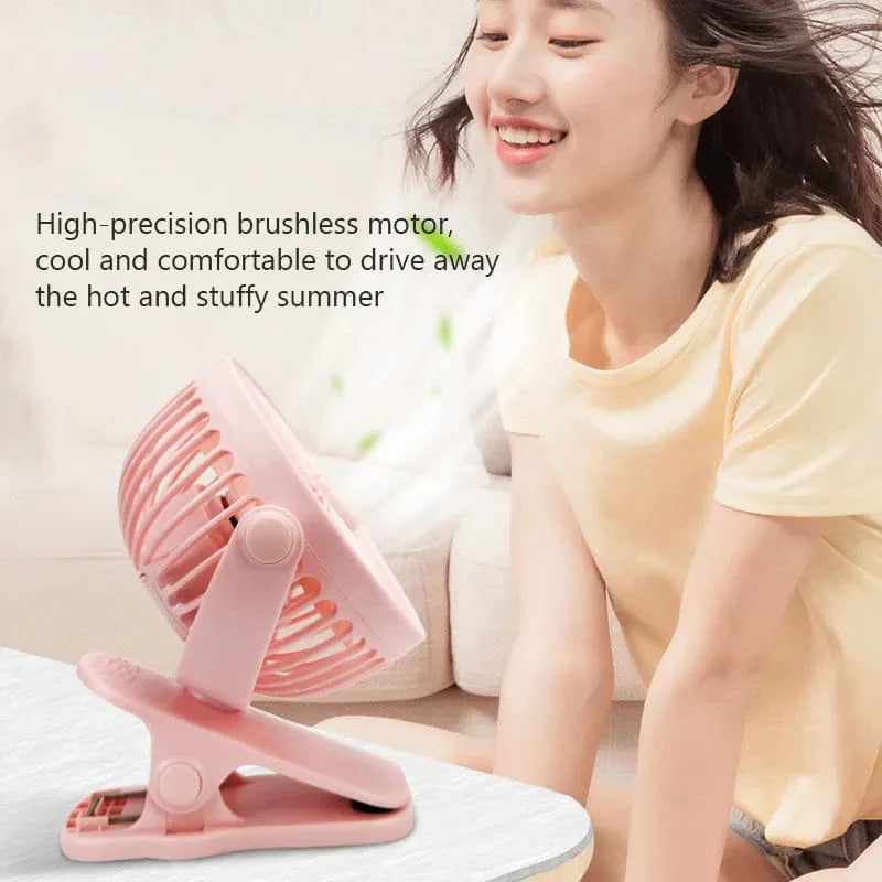 Showlu Fashion Store portable mini clip fan with USB charging, quiet operation, ideal for desktops, dorms, and small cooling needs.