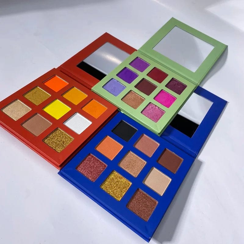 Showlu 9-Color eyeshadow palette with high-pigment matte and shimmer shades, cruelty-free eye makeup in a compact cardboard case.