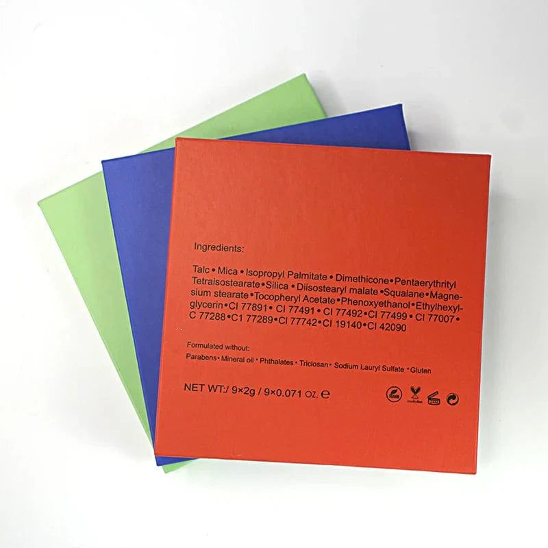 Showlu 9-color eyeshadow palette with high-pigment matte and shimmer shades, displayed in an empty cardboard case.