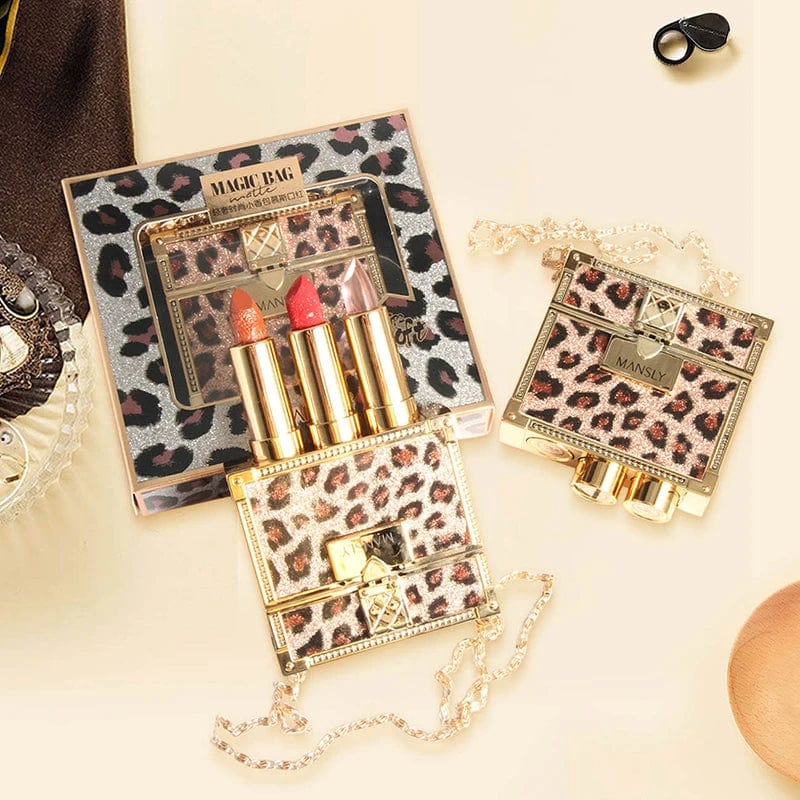 Showlu Fashion Store MANSLY 3-piece matte lipstick and lip balm set with glitter chain bag, featuring moisturizing velvet formulas.