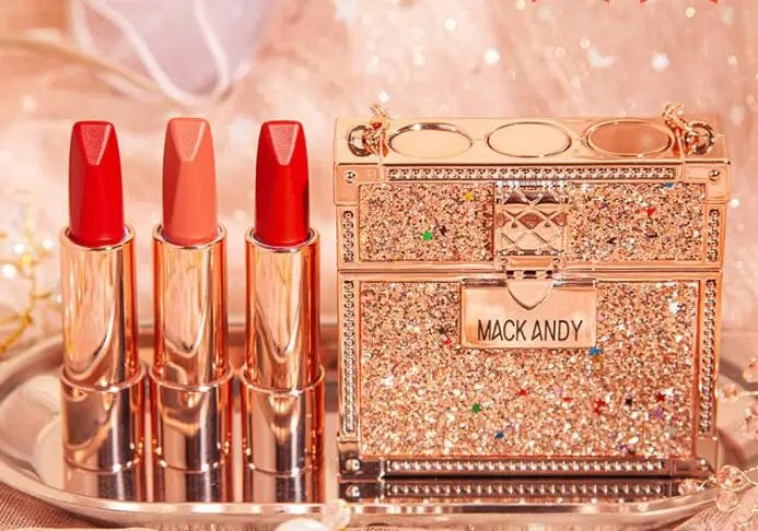 Showlu Fashion MANSLY 3-piece matte lipstick and lip balm set in glitter chain bag, featuring moisturizing velvet finish and elegant packaging.