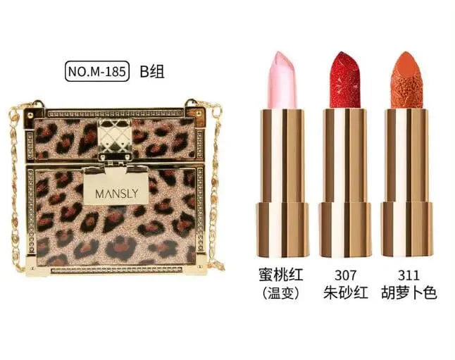 Showlu Fashion MANSLY 3-piece matte lipstick and lip balm set with glitter chain bag, moisturizing velvety finish, and stylish packaging.