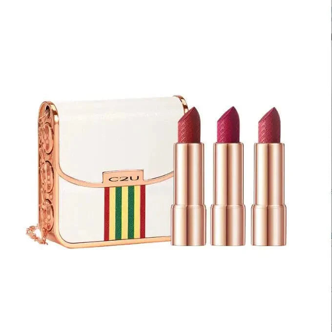 Showlu Fashion 3-piece matte lipstick and lip balm set with glitter chain bag, featuring moisturizing velvet finish and stylish design.