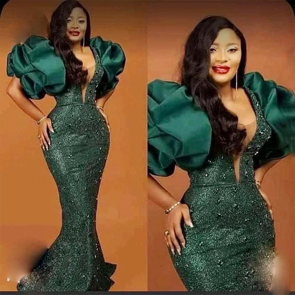 Hunter green mermaid prom dress with puff sleeves, beaded sequins, and a fitted silhouette, suitable for evening and party occasions.