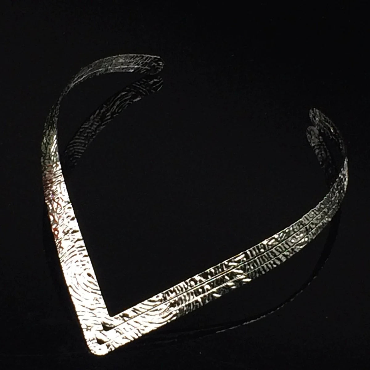 Multi-layer punk metal clavicle chain necklace with blade details, showcasing a bold street style design by Showlu Fashion.