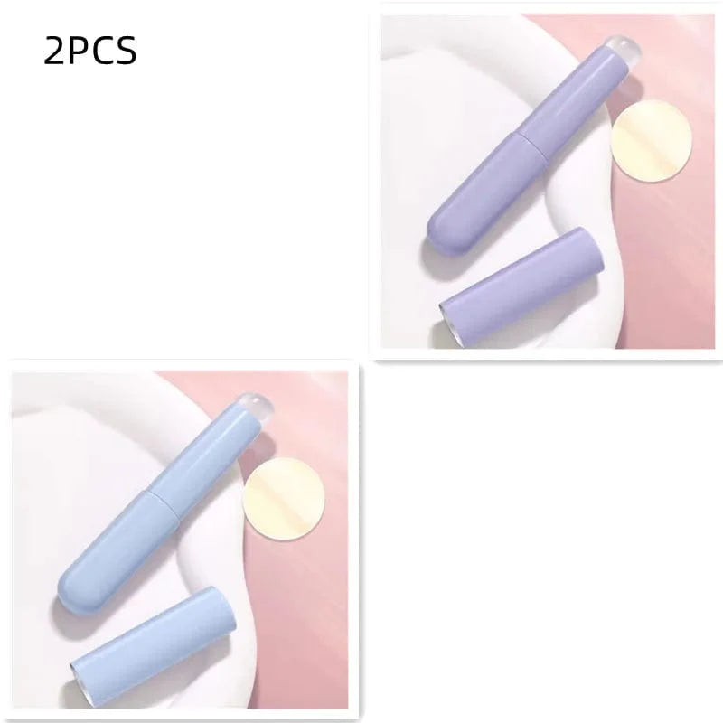 Showlu silicone lip brush with round head and dust-proof cover, ideal for lipstick application and multi-use cosmetic purposes.